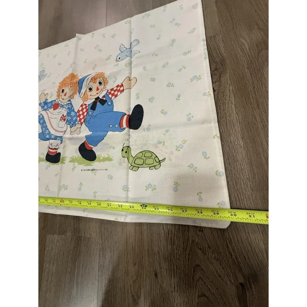 Vintage sheet and pillowcase featuring Raggedy Ann and Andy